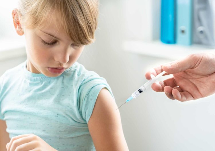 child-getting-a-typhoid-vaccine-at-the-doctor-s-office